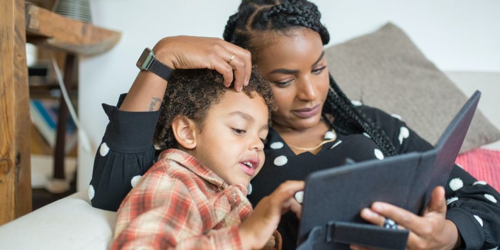 A young mother teaching her child about responsibility