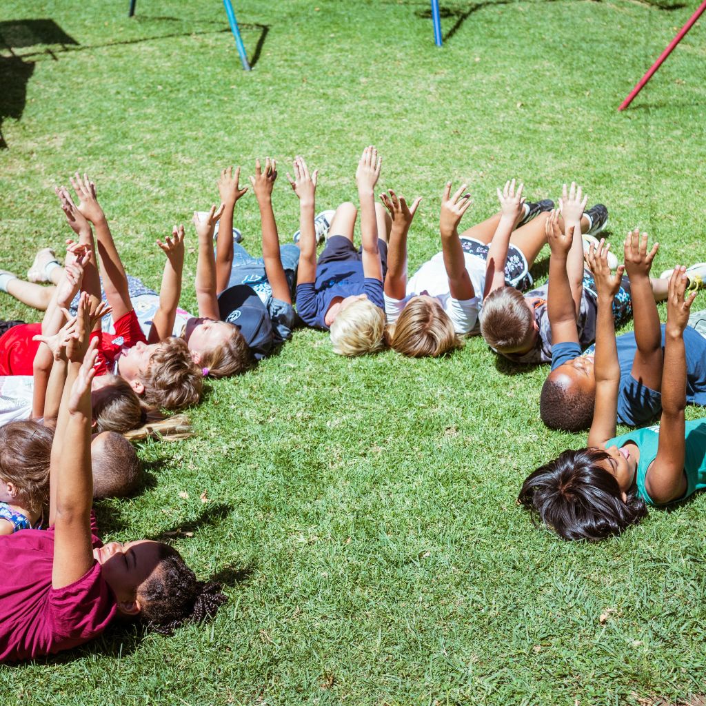 Children learning through play outside