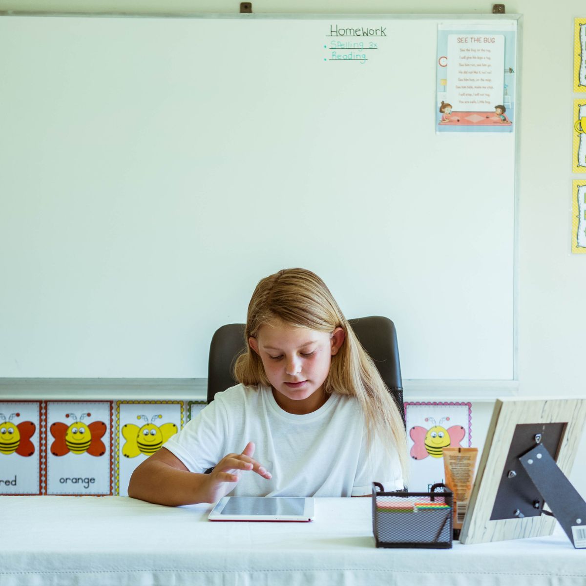 A learner using a tablet to learn grade 1 English